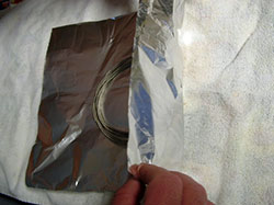 guitar strings wrapped in tin foil